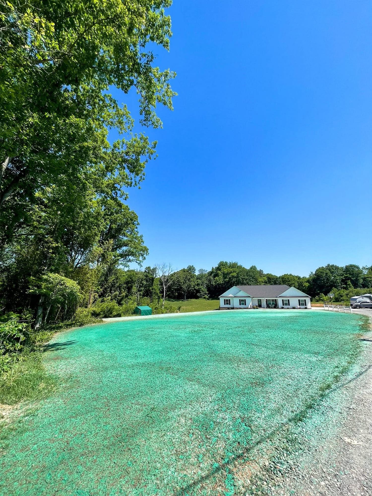 Freshly hydroseeded yard in front of a new construction home